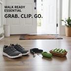 Green pet waste bag dispenser, refill rolls, leash, and walking shoes by a front door