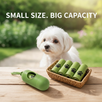 Green pet waste bag dispenser and matching refill rolls with a small dog